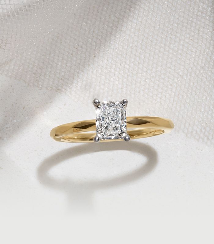 A Yellow Gold Solitaire Engagement Ring