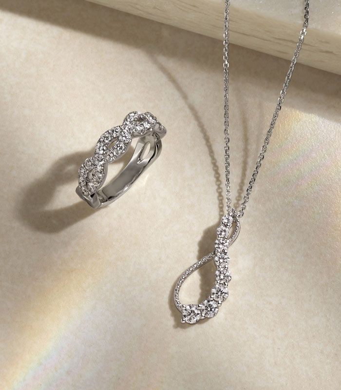 Mobile image of a diamond fashion pendant and fashion ring