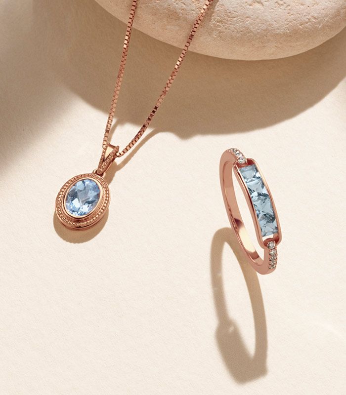 An aquamarine fashion pendant and fashion ring