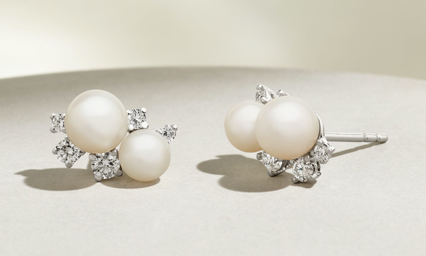 A pair of pearl and diamond fashion earrings