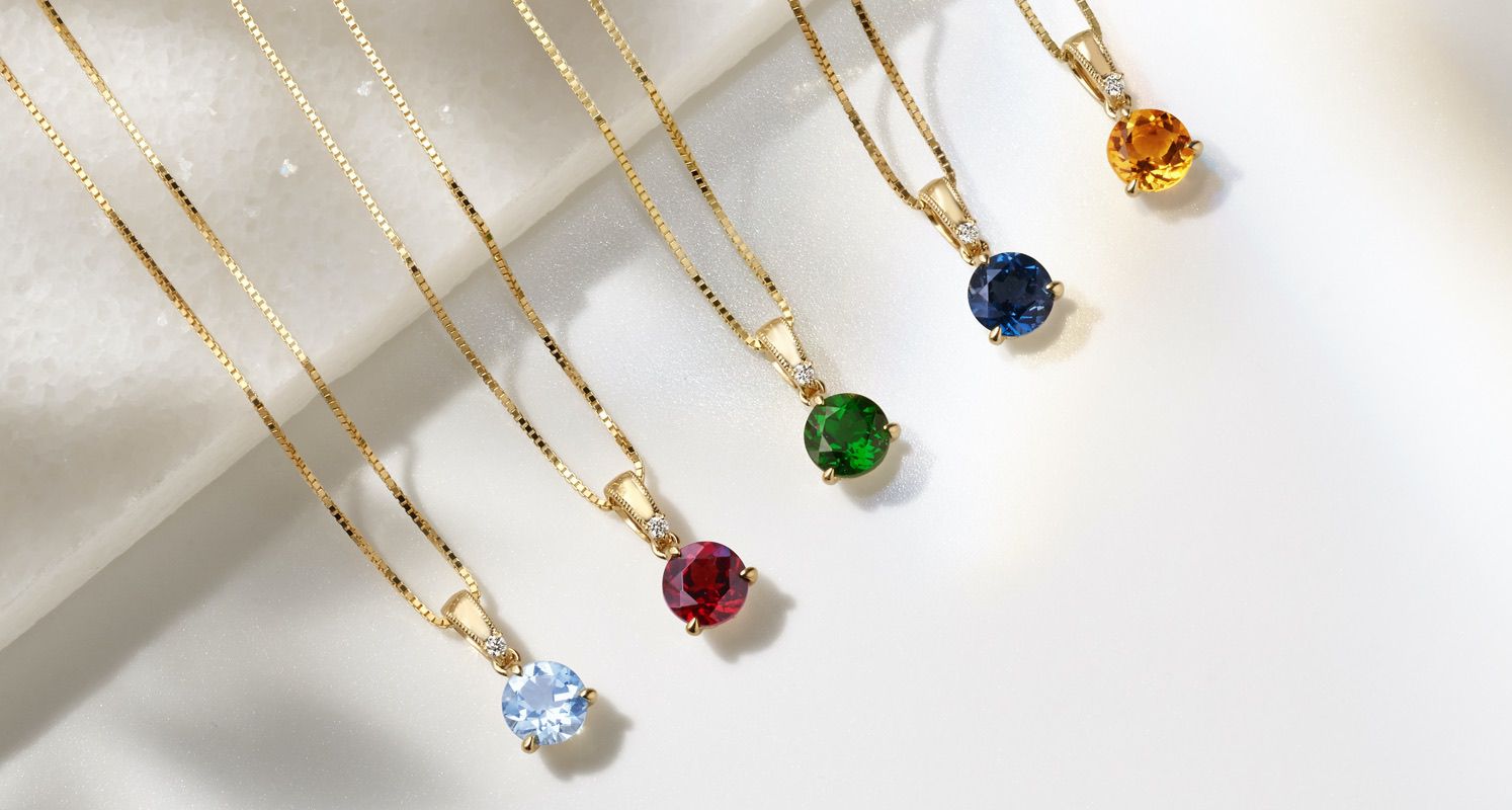 A collection of solitaire gemstone pendants