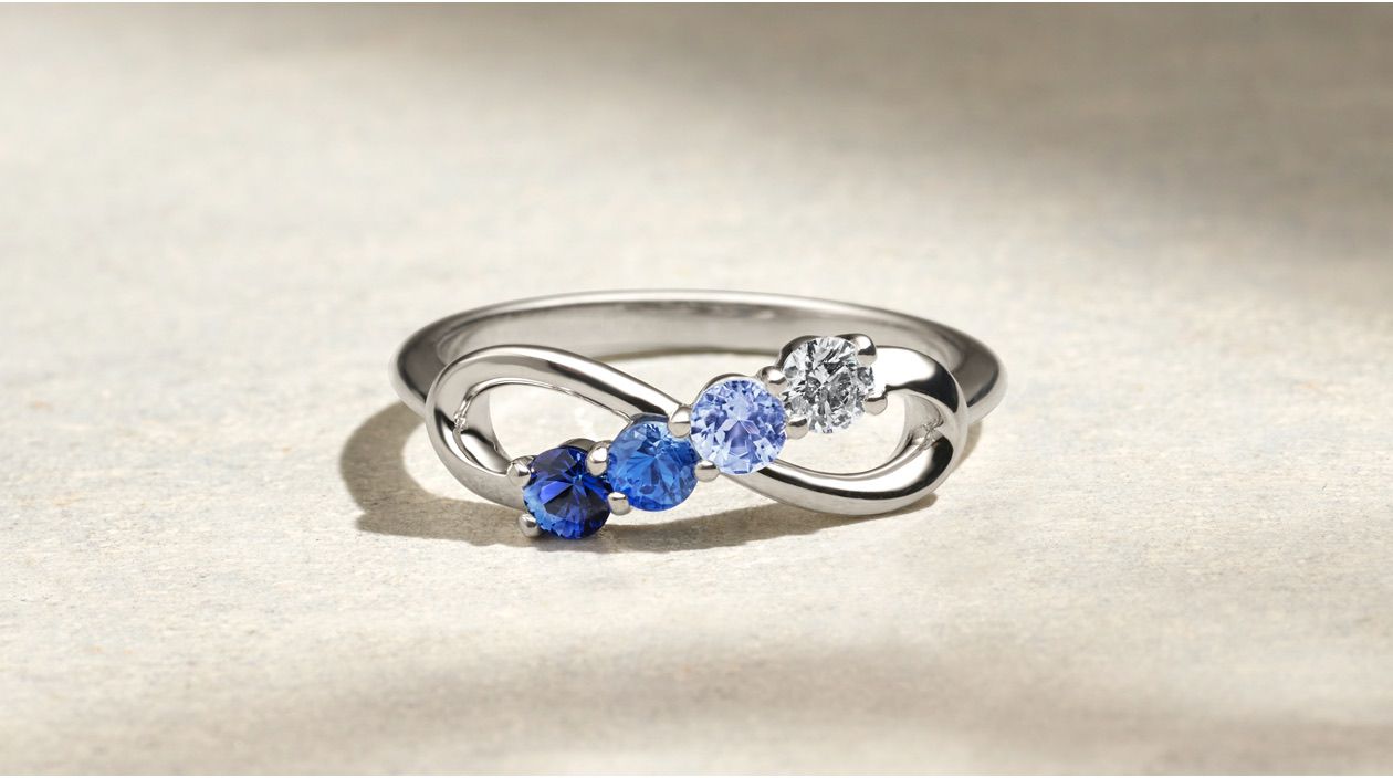 A fashion ring with four gemstones