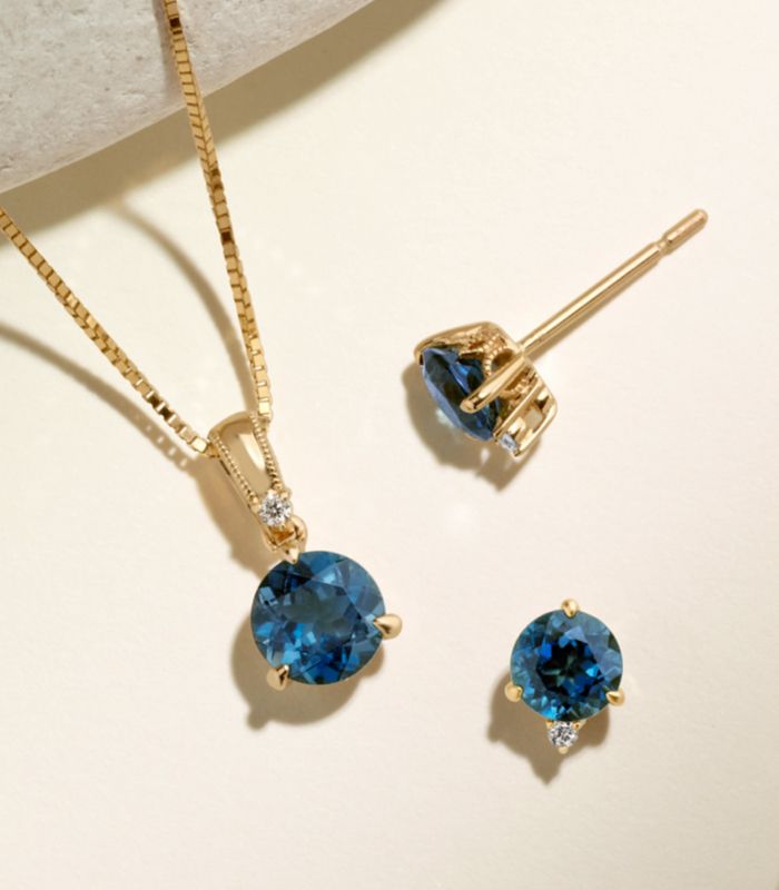 A collection of blue gemstone fashion jewelry