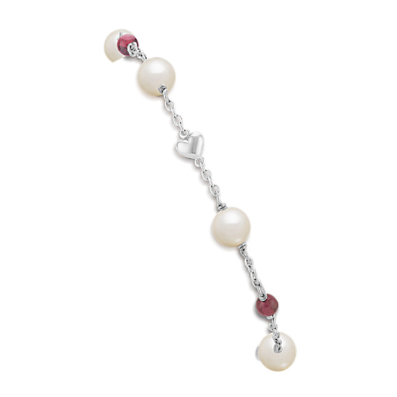 6mm Cultured Freshwater Pearl and Garnet Bracelet in Sterling Silver (7.5") 6mm Cultured Freshwater Pearl and Garnet Bracelet in Sterling Silver (7.5")
