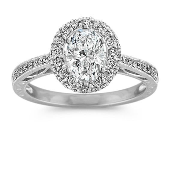 Vintage Oval Halo Engagement Ring with Pavé Set Diamonds Vintage Oval Halo Engagement Ring with Pavé Set Diamonds