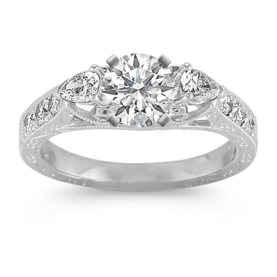 Vintage Pear-Shaped and Round Diamond Platinum Engagement Ring Vintage Pear-Shaped and Round Diamond Platinum Engagement Ring