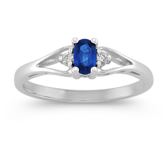 Oval Sapphire and Round Diamond Three-Stone Ring Oval Sapphire and Round Diamond Three-Stone Ring