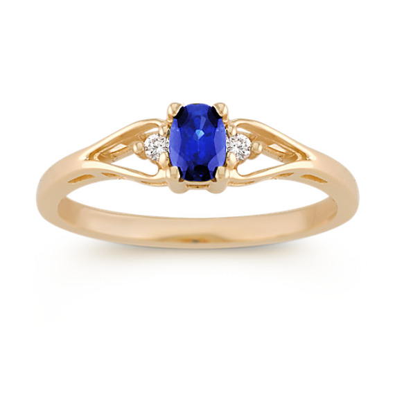 Oval Sapphire and Round Diamond Three-Stone Ring Oval Sapphire and Round Diamond Three-Stone Ring