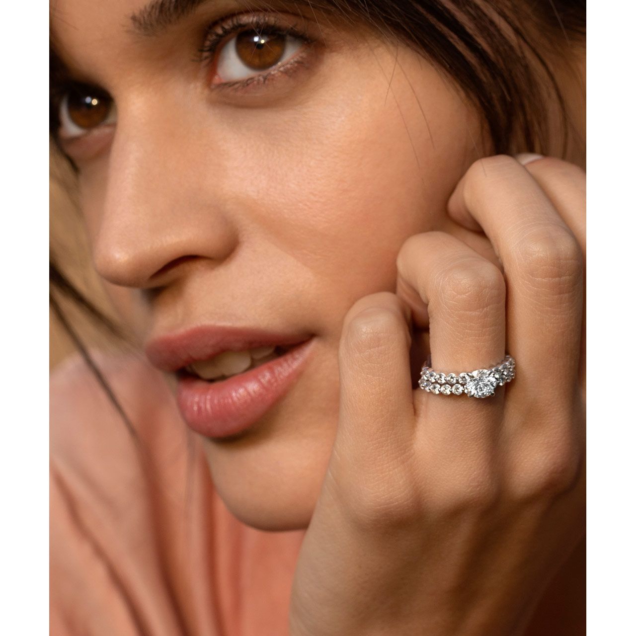 Close Up of Woman Wearing Diamond Engagement Ring