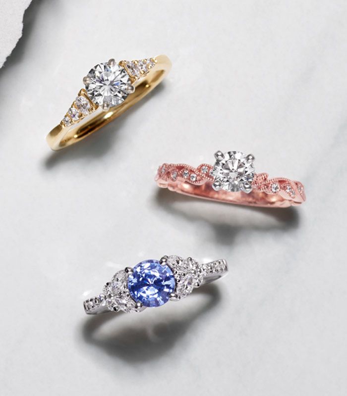 Top View of Three Different Gold Band Engagement Rings