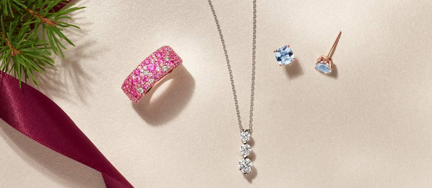 A collection of fashion jewelry on a festive background