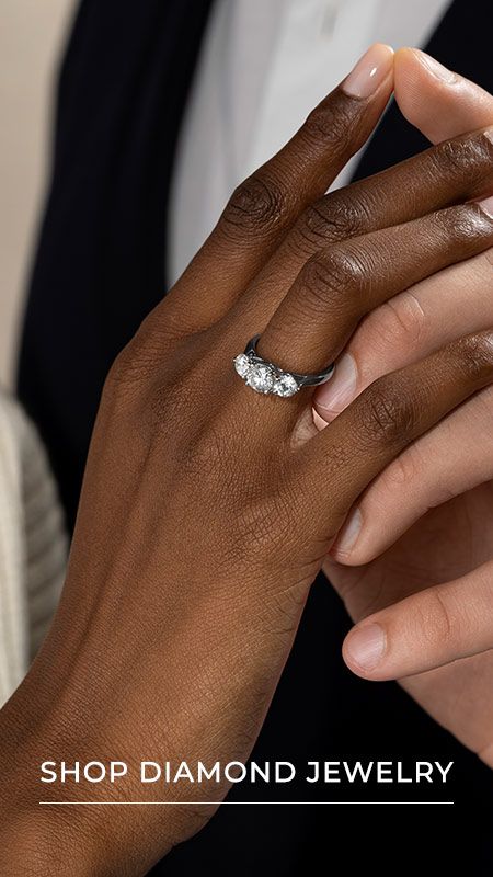 A couple's hands holding each other