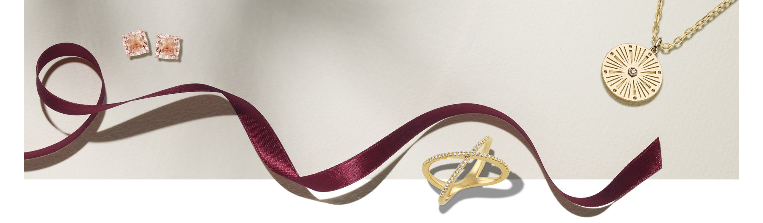 Image of holiday ribbon and trendy jewelry