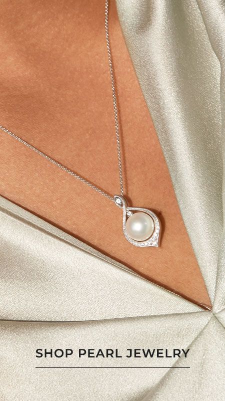 Woman Wearing Pearl Pendant