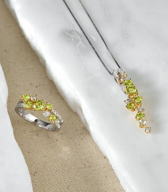 A peridot fashion pendant and fashion ring