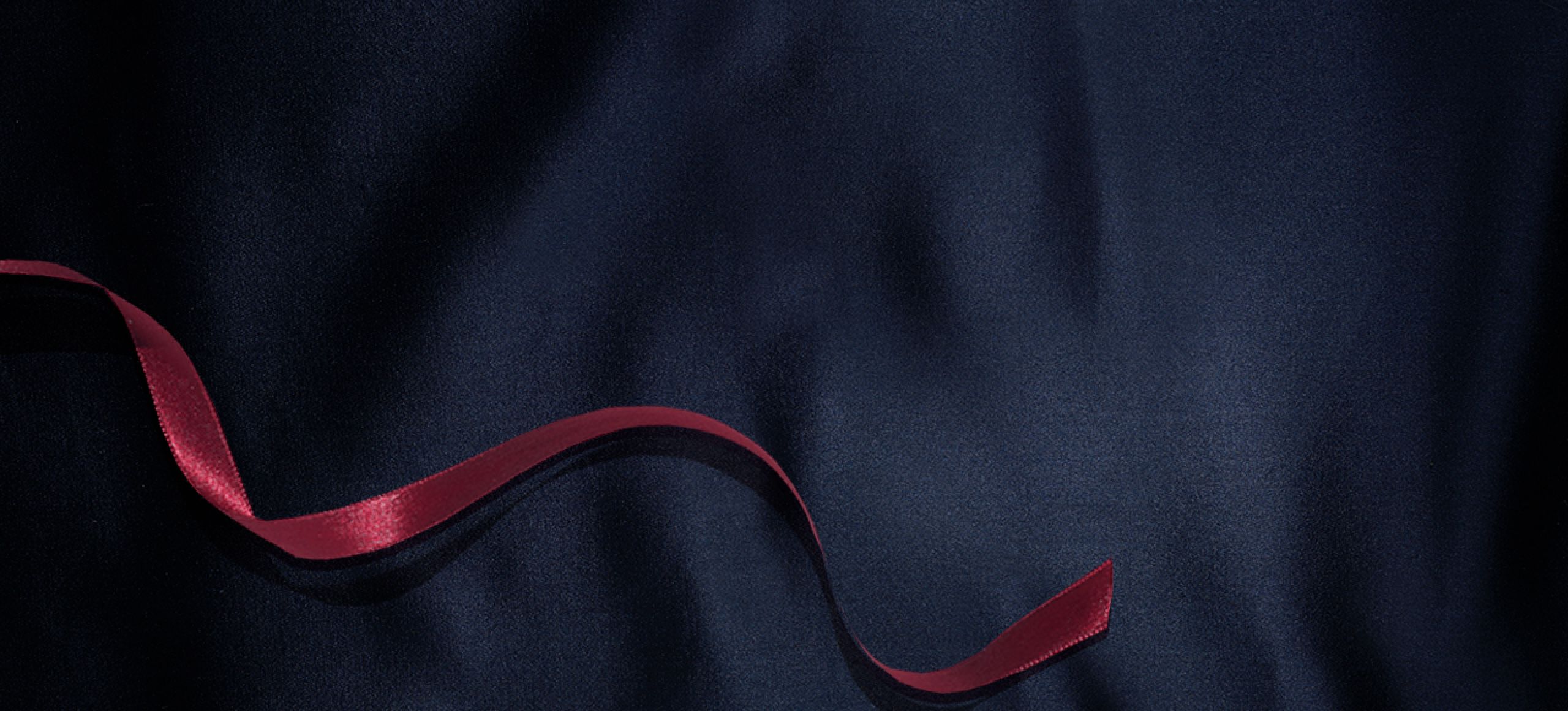 An image of a ribbon on a cloth background