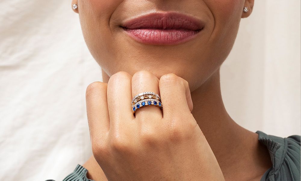 https://images.shaneco.com/is/image/ShaneCo/2021-Jewelry-Rings-StackableRingStyles-1494x900?wid=1000