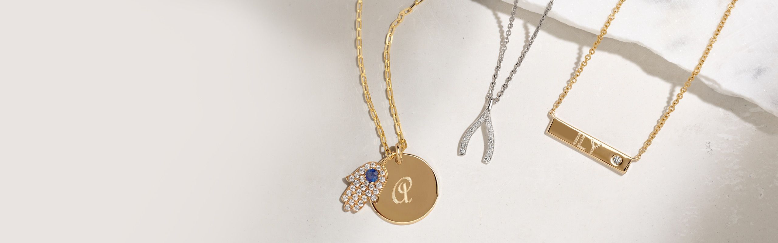A collection of personalized jewelry