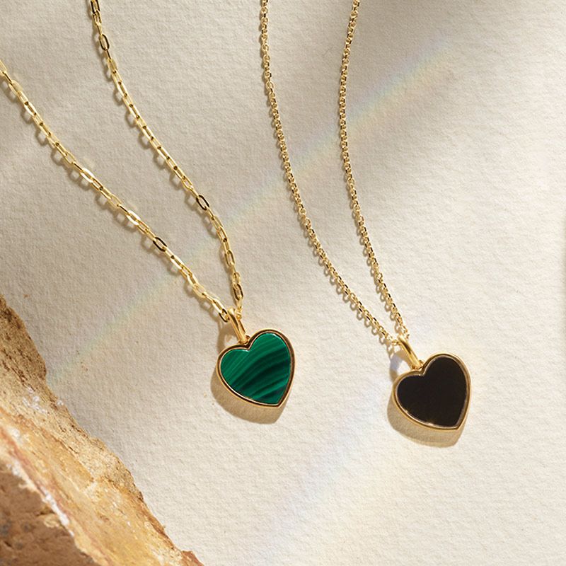 Two heart shaped fashion pendants