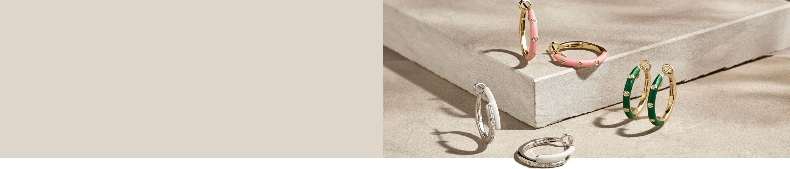 A collection of enamel hoop earrings