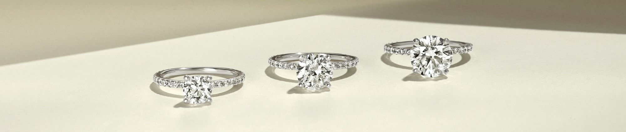 Desktop image of three engagement rings