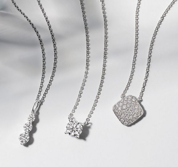 Mobile image of a collection of diamond fashion pendants