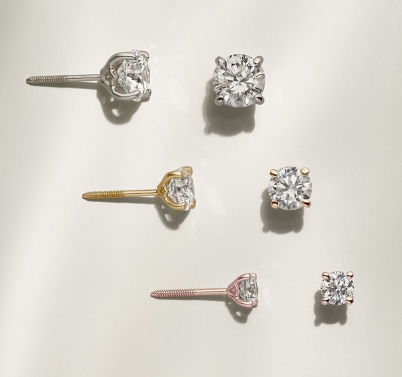 A collection of diamond stud earrings