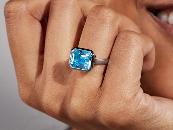 Mobile image of a woman wearing a fashion ring