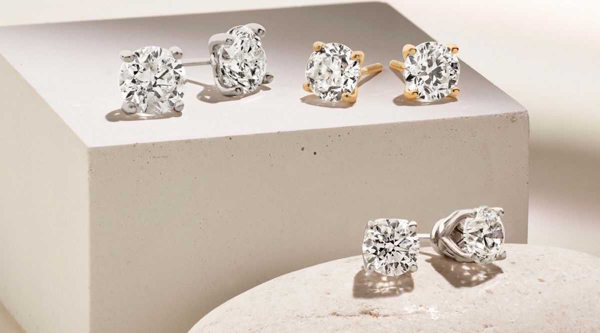 A collection of diamond stud earrings