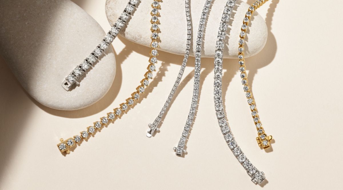 A collection of diamond tennis bracelets