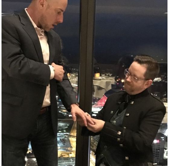 A man proposing to his partner