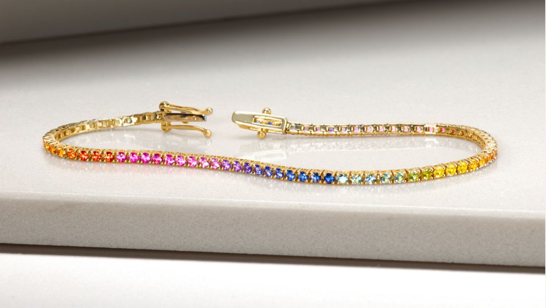 A fashion tennis bracelet with rainbow sapphires