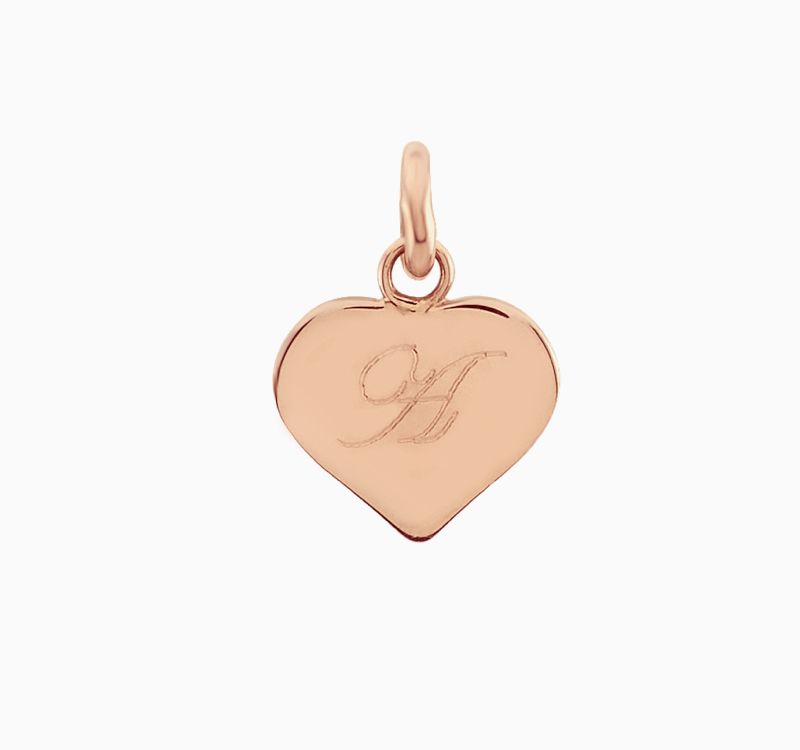 A gold heart shaped charm