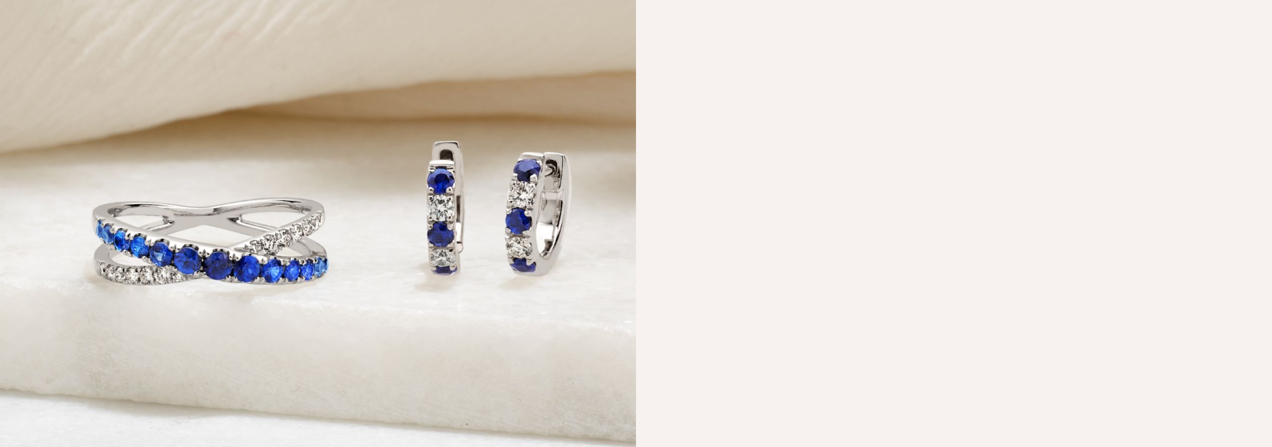A sapphire and diamond ring with matching hoop earrings
