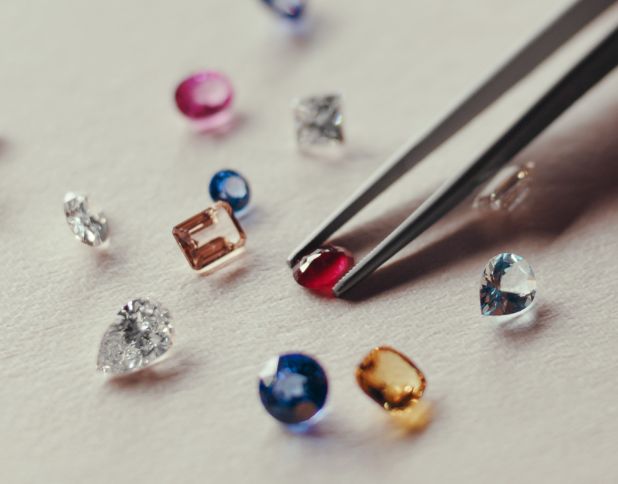 Colorful Gemstones with a Pair of Tweezers