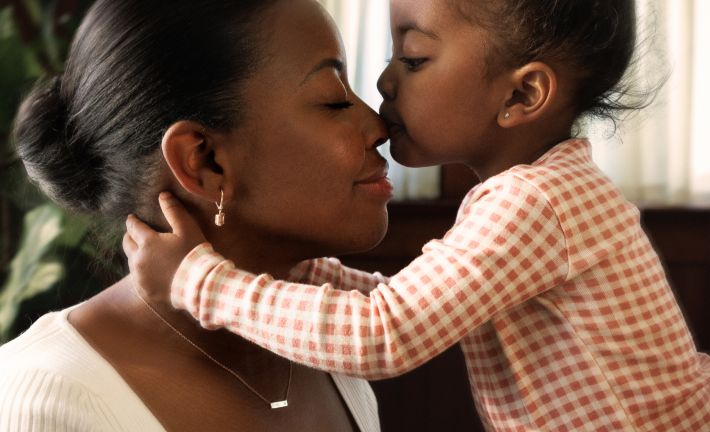 Mother and Daughter embracing