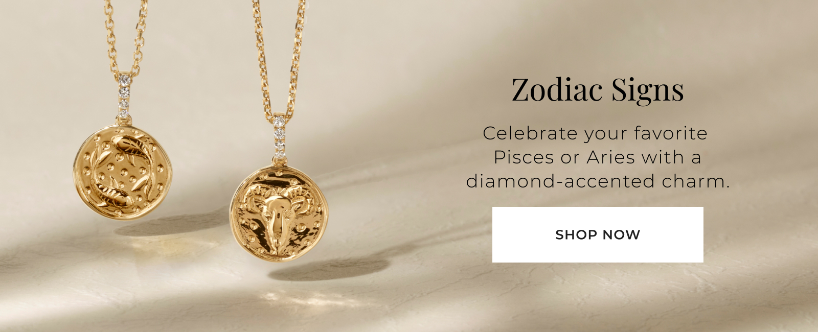 Zodiac Signs - Celebrate your favorite Pisces or Aries with a diamond-accented charm. Shop Now >