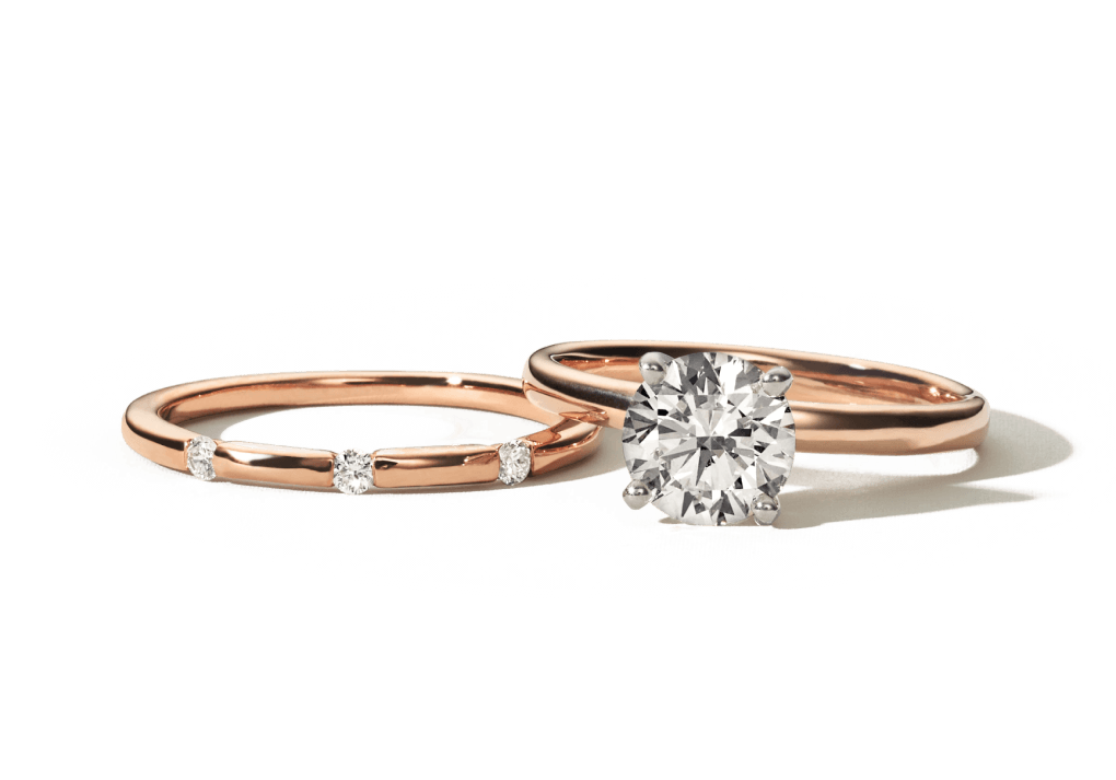 A solitaire engagement ring and matching wedding band