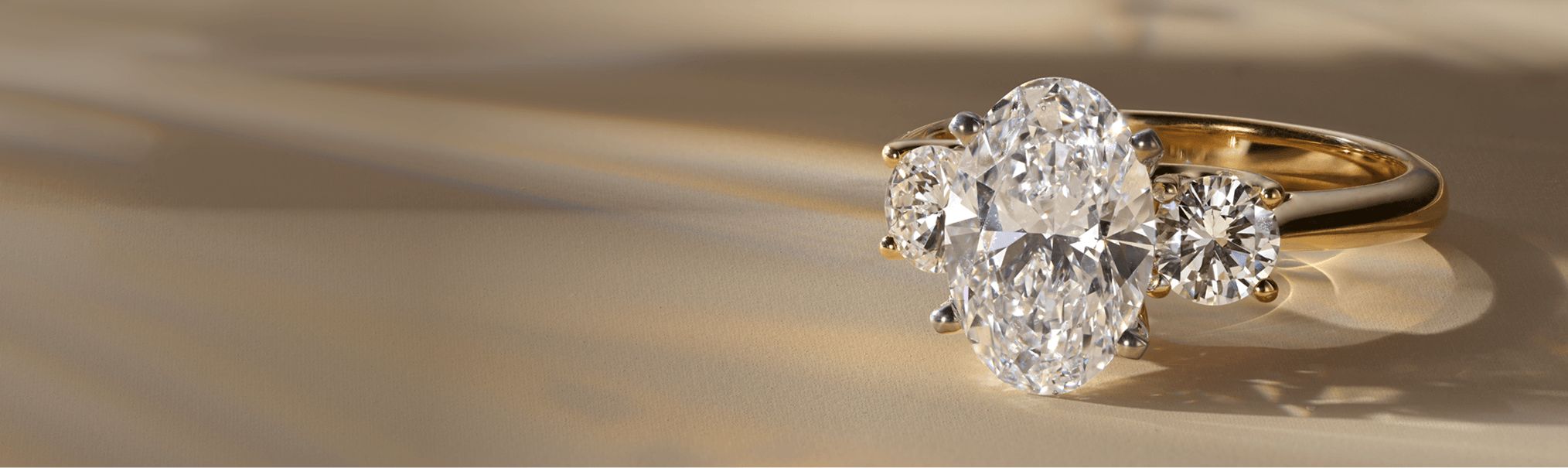 A lab-grown 3 stone diamond engagement ring