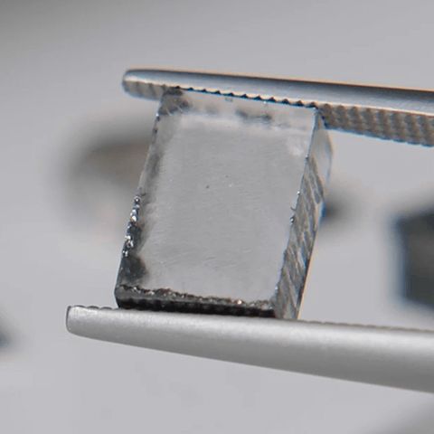 The lab grown rough diamond with the carbon removed and cleaned up.