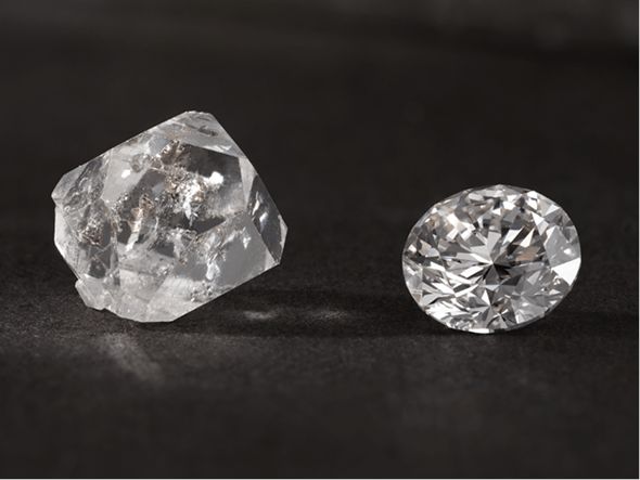 A rough cut diamond and a fully finished natural diamond on a dark background