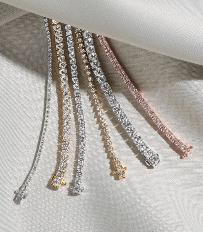 Mobile image of a collection of diamond tennis bracelets