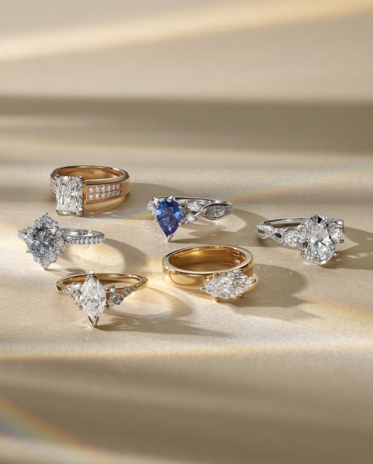 Six engagement rings with different styles of center stone