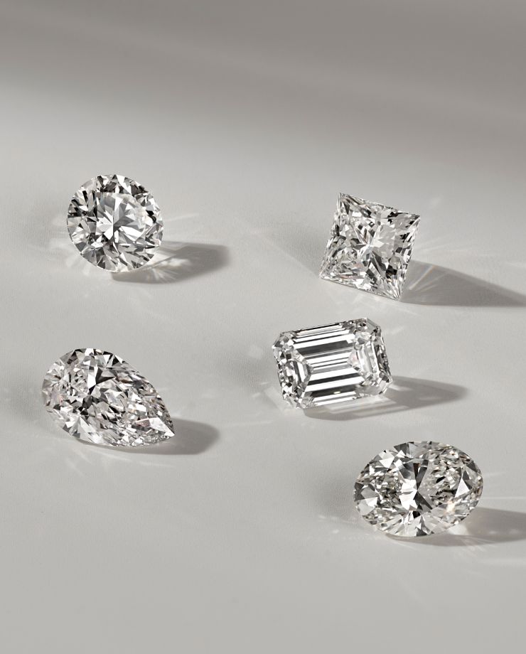 Five loose diamonds in different shapes