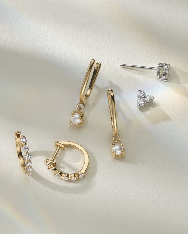 Three pairs of earrings of different styles