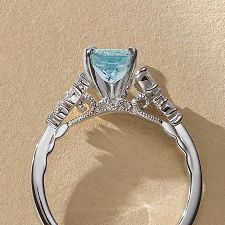 A cathedral diamond engagement ring