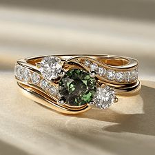 A diamond swirl engagement ring with a colored center stone