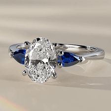 A diamond and sapphire engagement ring