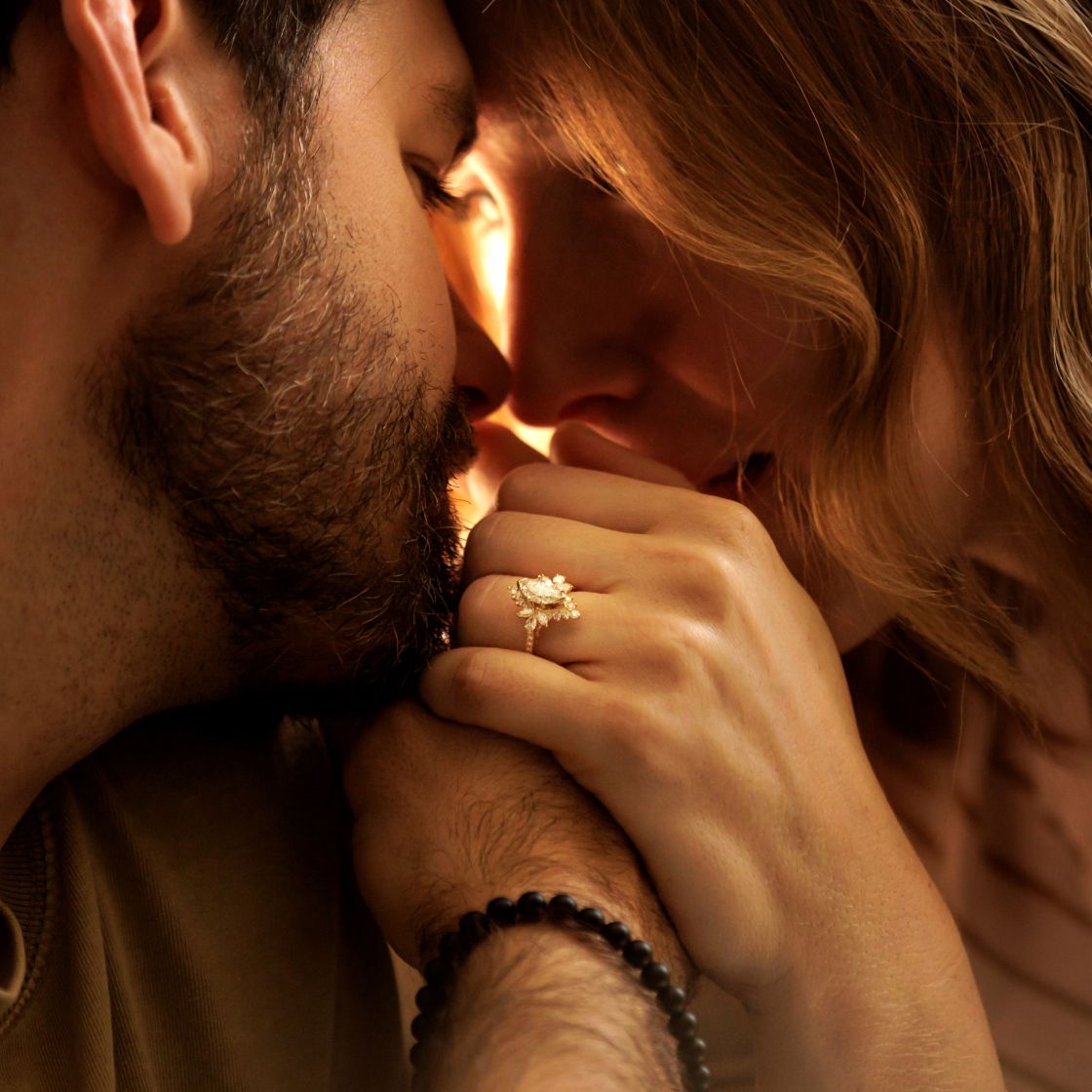 A woman wearing a diamond wedding ring set