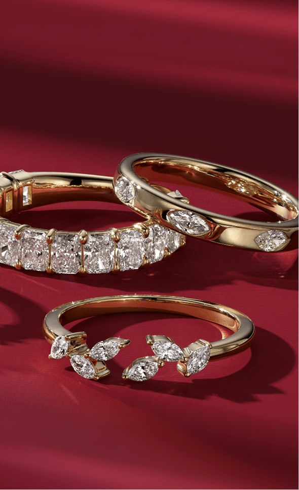 A collection of diamond wedding bands of different styles